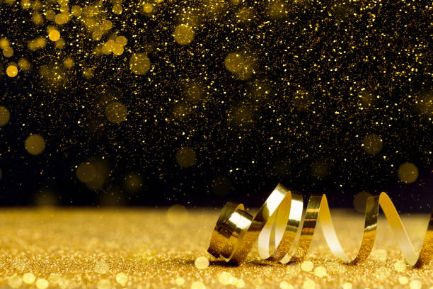 istock Christmas holidays background with golden ribbon 1064522836