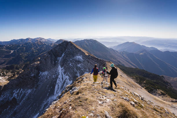istock Friends hiking in the mountains 1064528812