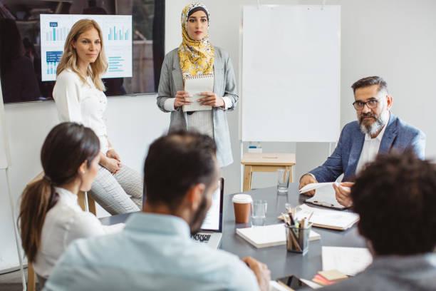 istock Explaining coworkers new business idea 1064530208