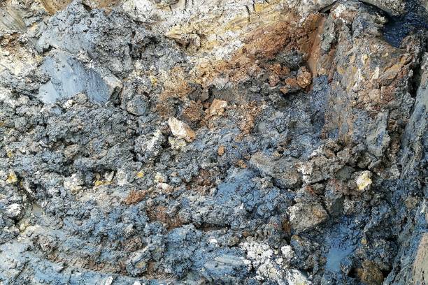 istock wet and dirty soil after dig by backhoe 1064532482