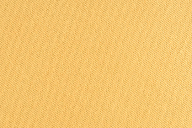 Yellow fabric texture background. Abstract background, empty template. Yellow fabric texture background. Abstract background, empty template. vogue cover stock pictures, royalty-free photos & images