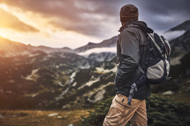 istock Traveling alone in the mountains at sunset 1064536462