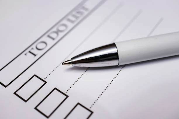 istock close up reminder note paper and to do list with pencil 1064539012