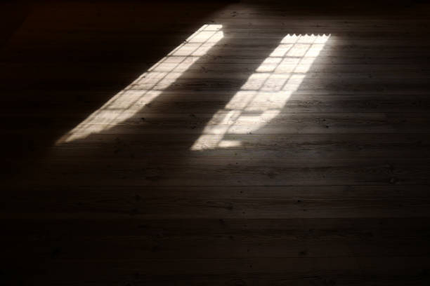 istock Wooden floor with sun ray 1064539156