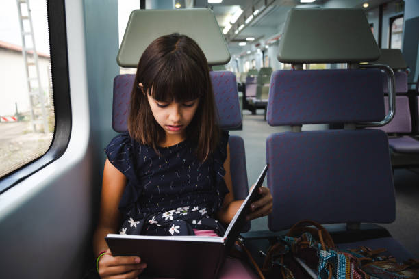 istock The trip is shorter reading a book 1064539520