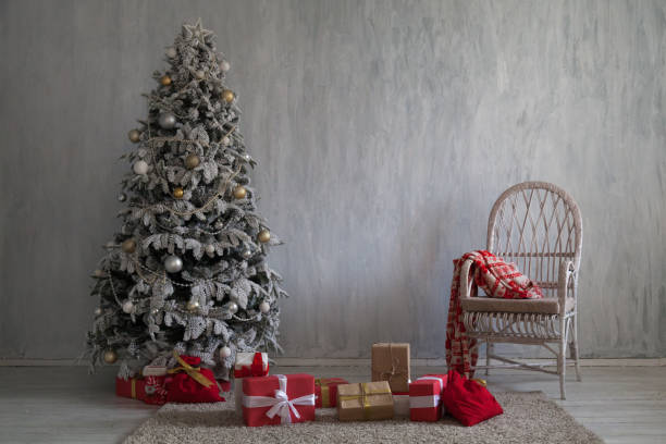 istock Christmas tree winter new year 2019 decor gifts background 1064539562