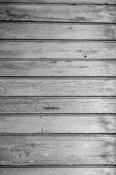 istock Old vertical pink wooden planks outdoors. Vintage rustic background texture. 1064540872