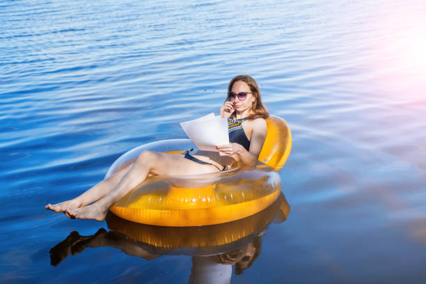istock Business woman working on vacation, remote work. 1064541268