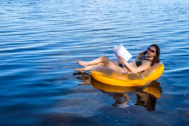 istock Woman is workaholic working during the vacation. 1064541290