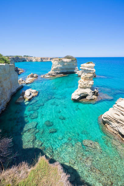 istock Sant Andrea, Apulia - Erosion shaped the coastline around the cliffs 1064546416