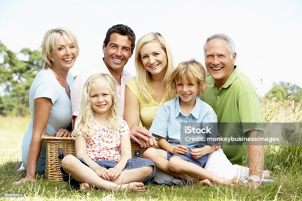 Family having picnic in countryside  30-39 Years Stock Photo