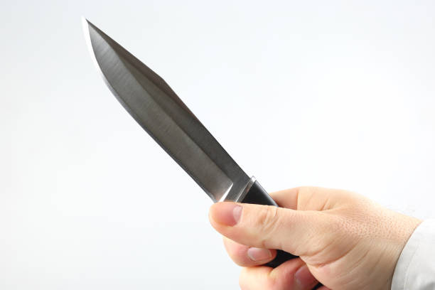 istock knife in the hands of a man 1064552018