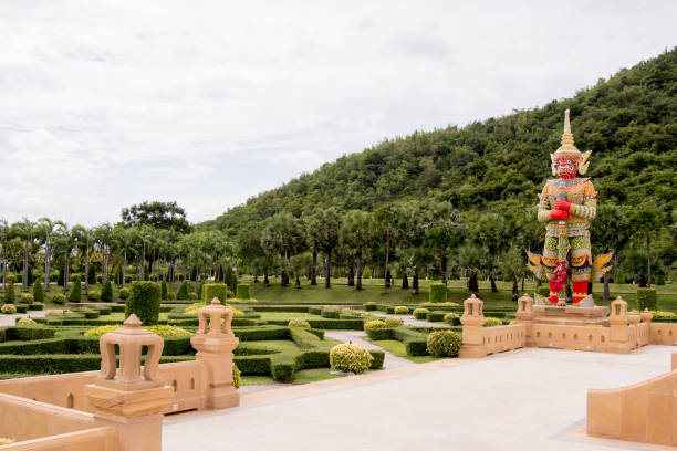istock Garden with historical statue, located near a Buddha Statue 1064556402