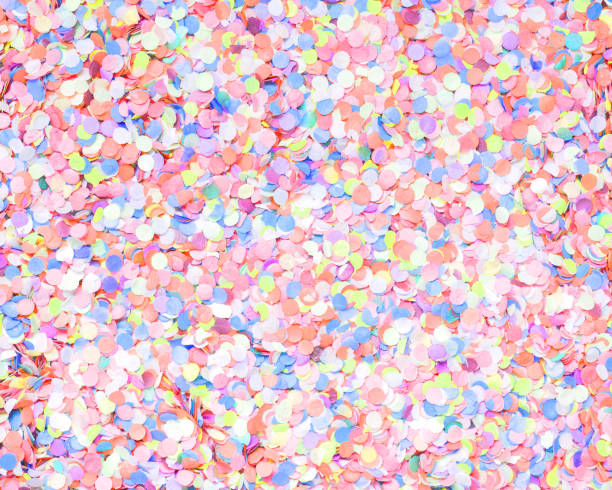 istock Confetti diversity light background, large size. Texture colored circles from paper, close-up. Basis for a festive design or a postcard. Carnival, abstract wedding or birthday backdrop 1064556698