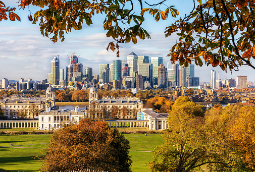 View to the skyline of the financial district Canary Wharf in London during autumn time, United Kingdom