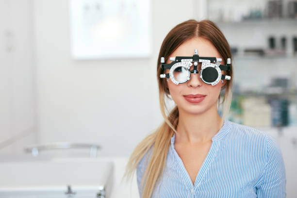 istock Eyesight Test. Woman In Optometrist Trial Frame At Optometry 1064565178
