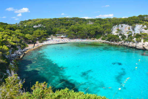 istock Turquoise water in bay Cala Macarella on Menorca 1064565740