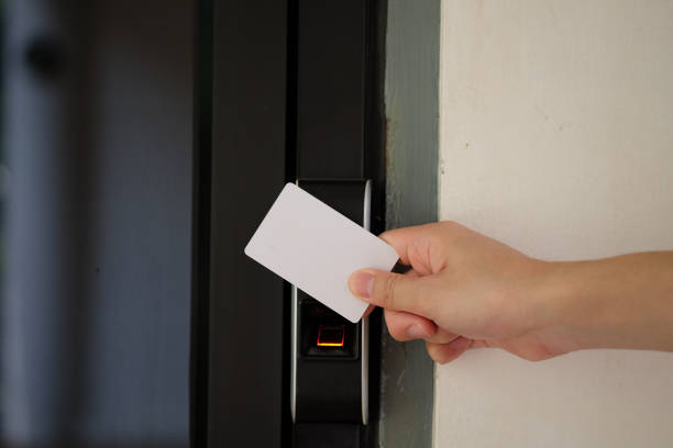 istock Biometric fingerprint scanner with keycard. 1064568152