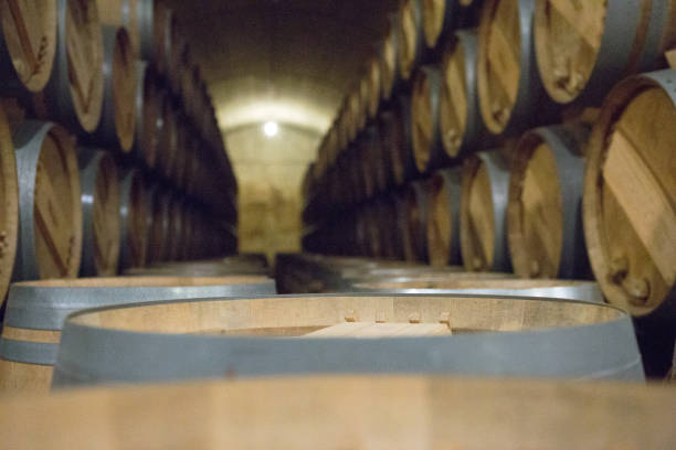 istock Wooden wine barrels in close up 1064568456