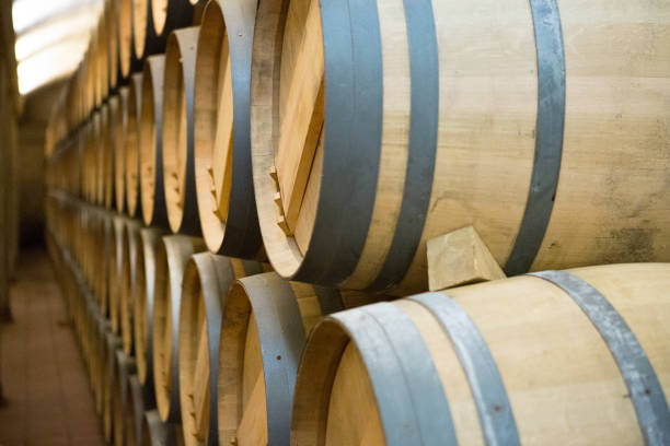 istock Wooden wine barrels stacked 1064568500