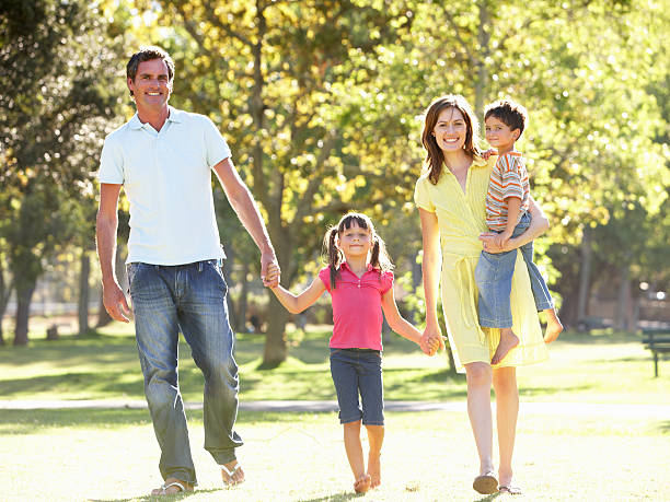 istock Family Enjoying Walk In Park 106456972