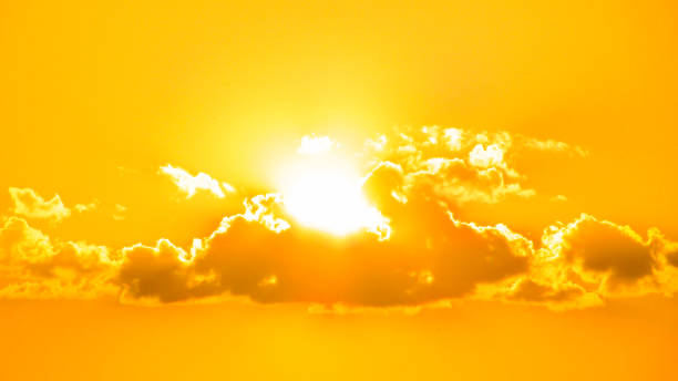 istock Sunset a beautiful sky orange golden clouds 1064570790