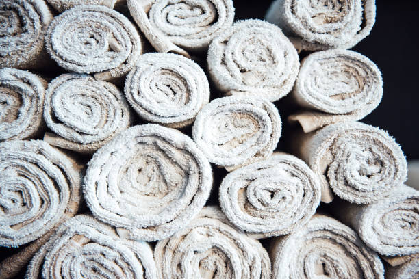 istock white clean barberman towels rolled into a cylinder 1064573454
