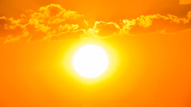 istock Sunset a beautiful sky orange golden clouds 1064578670