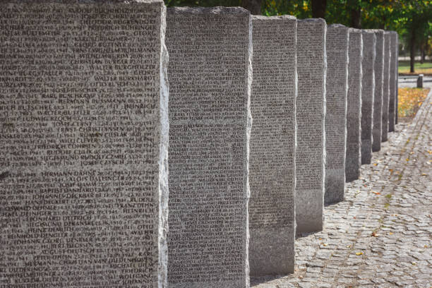 istock identical stone tombs with lettering placed in row at graveyard 1064578788