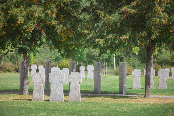 istock old memorial stone crosses placed in rows at cemetery 1064579120