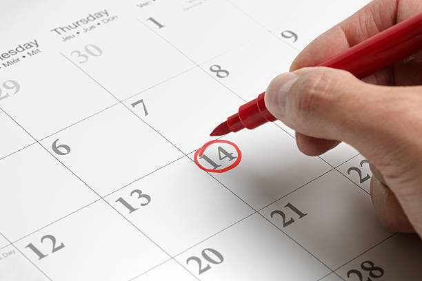 A circled date on a large calendar in red ink Red circle marked on a calendar concept for an important day calendar date circled stock pictures, royalty-free photos & images