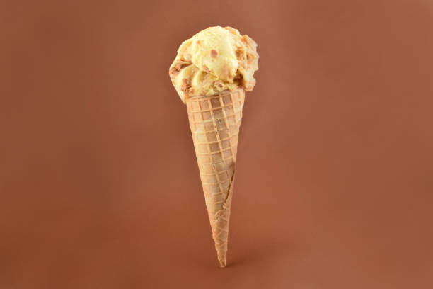istock Vanilla ice cream cone stock images 1064580046