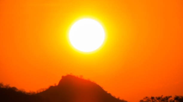 istock Sunset a beautiful sky orange golden clouds 1064581586