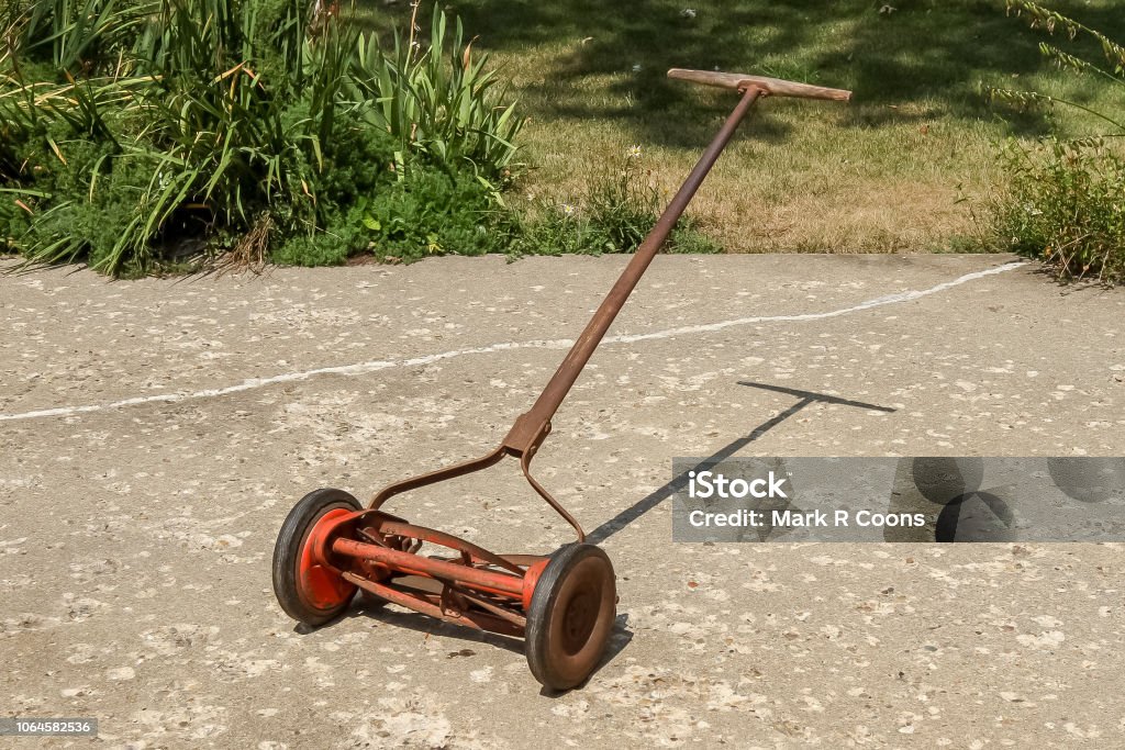 Full View Of A Reel Lawnmower Before The Paint Was Removed Stock Photo -  Download Image Now - iStock
