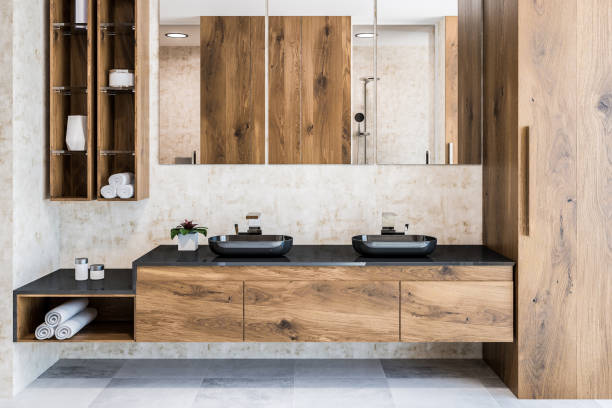 istock Dark wooden bathroom, white double sink 1064588278