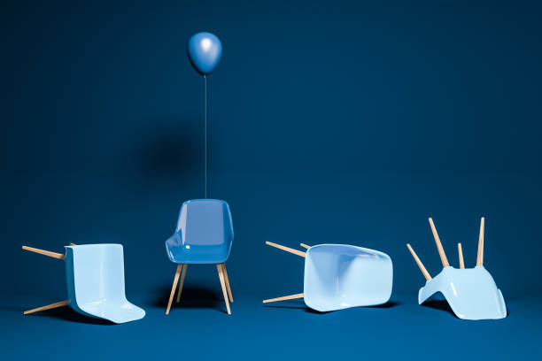 istock Dark blue room with chairs lying and one standing 1064589140