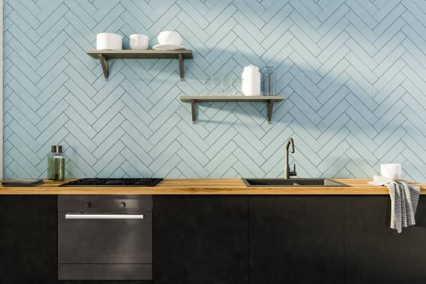 istock Gray kitchen interior with black countertops 1064593658