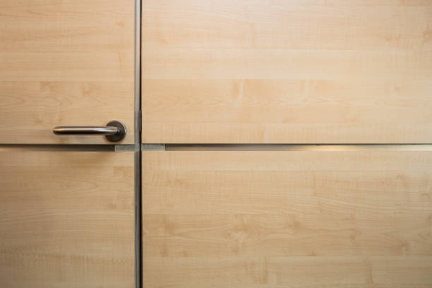 istock Shiny wooden door and wall texture background modern design 1064597338
