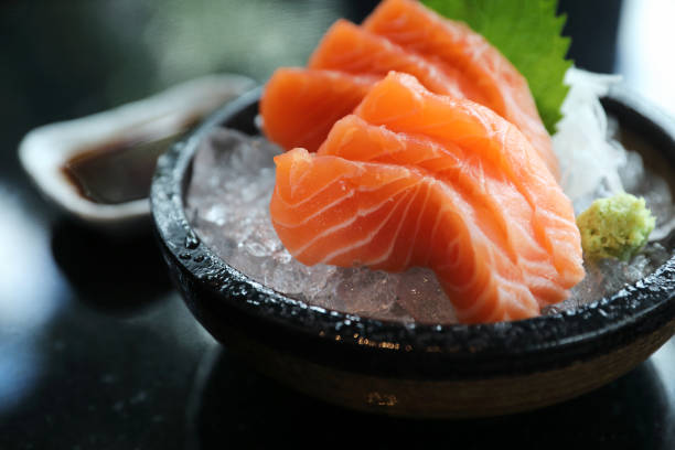 istock Salmon sashimi on ice Japanese food 1064598454