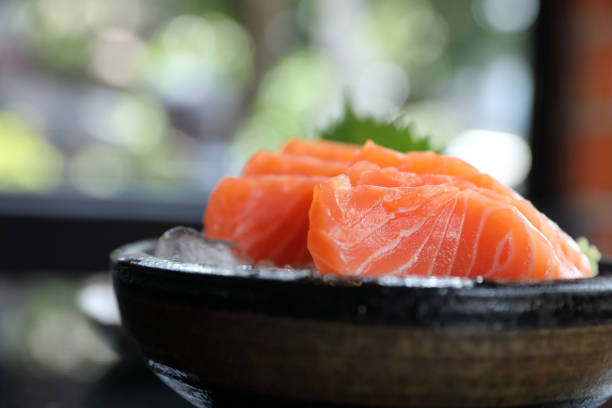 istock Salmon sashimi on ice Japanese food 1064599530