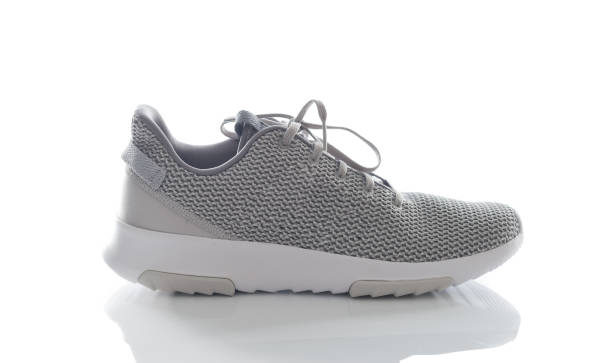 istock men's sport shoes,Shoe Sneakers isolate on white. 1064603102