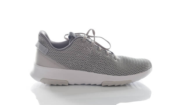istock men's sport shoes,Shoe Sneakers isolate on white. 1064603140