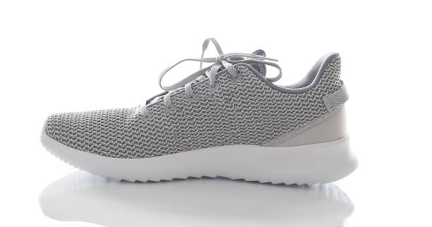 istock men's sport shoes,Shoe Sneakers isolate on white. 1064603160