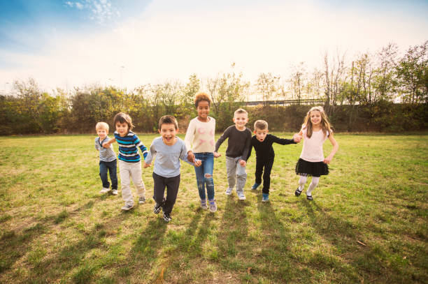 Happy children playing on field