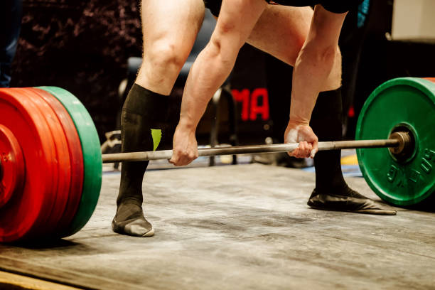 istock performing deadlift man powerlifter competition powerlifting 1064603674