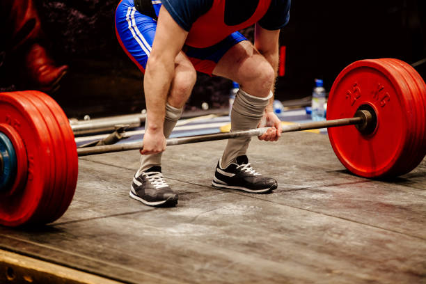 istock man powerlifter deadlift weight training exercise 1064603712