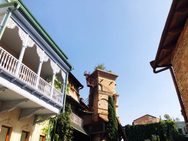 istock Old Tbilisi architecture, windows and balcony exterior decor in summer day 1064604204
