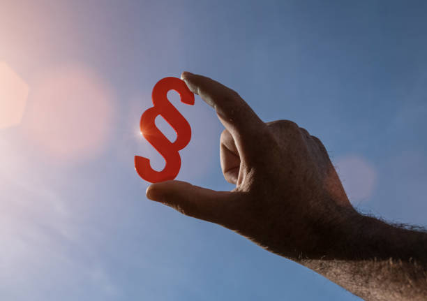 istock Symbol of Justice - paragraph section sign 1064604772