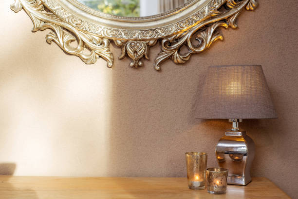istock Interior with mirror and decoration lamp and candles with brown wall 1064611248