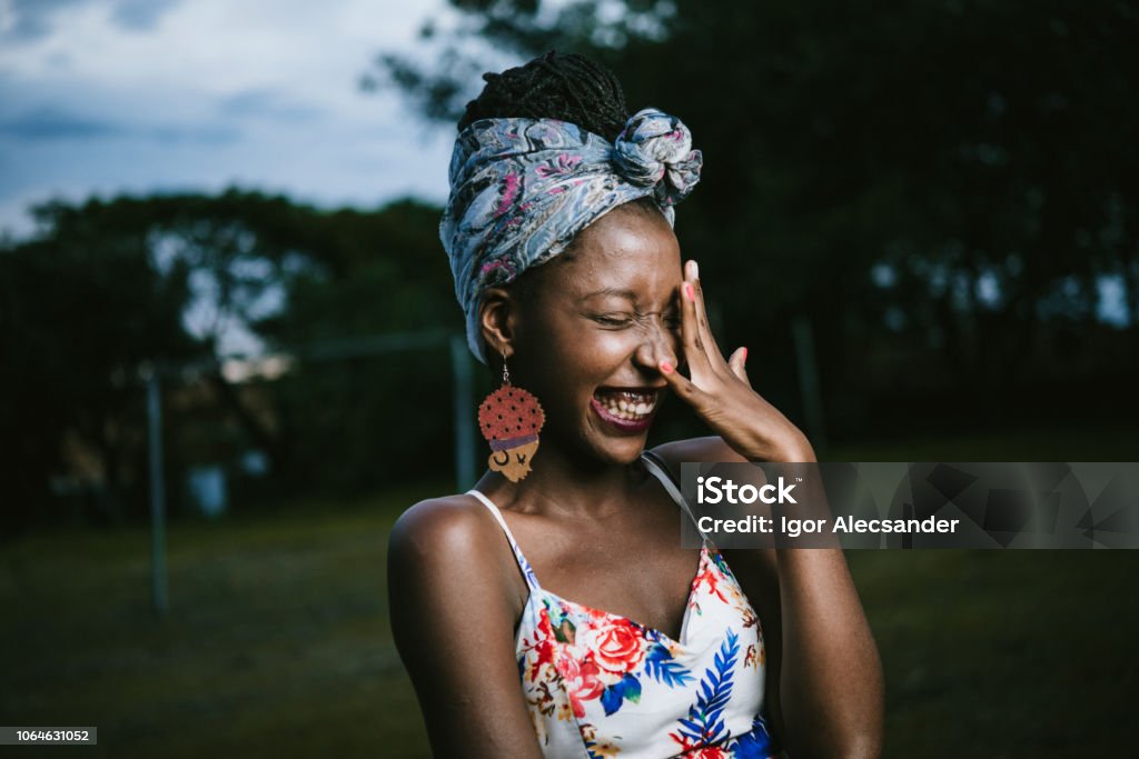 Beautiful african-american young woman Portrait of a Beautiful afro-american young woman Embarrassment Stock Photo